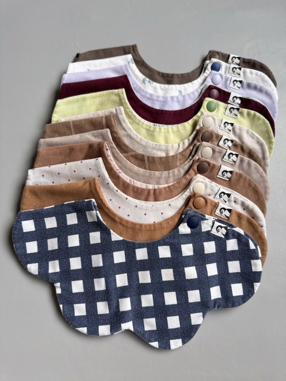 Multi-Pack Kids Bibs in Navy Check and Neutral Colors